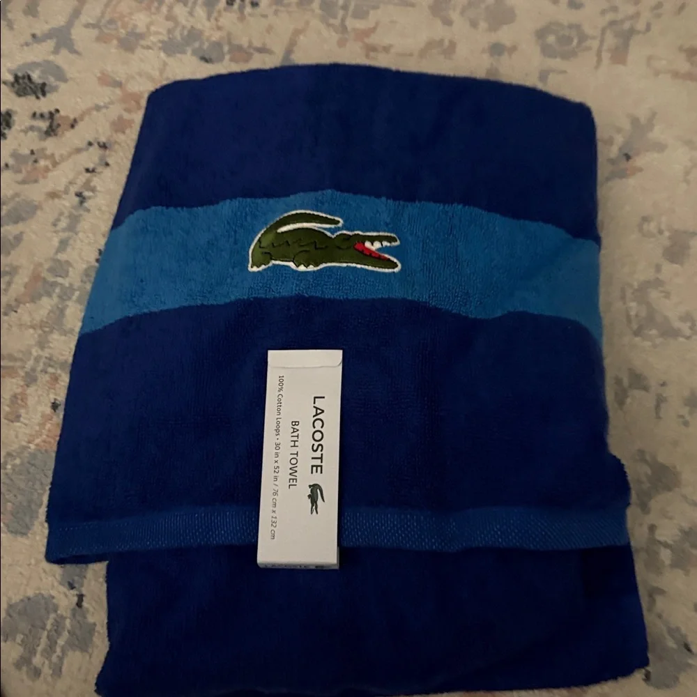 Lacoste blue Towel 30in x 52in. NWT 1